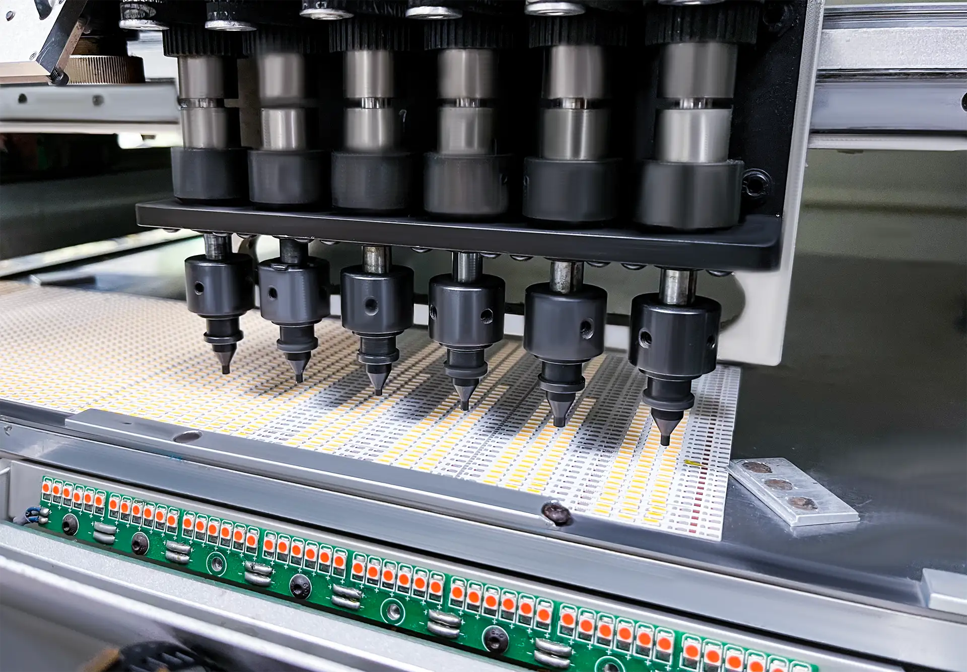SMT pick and place machine mounting LED chips onto PCB board