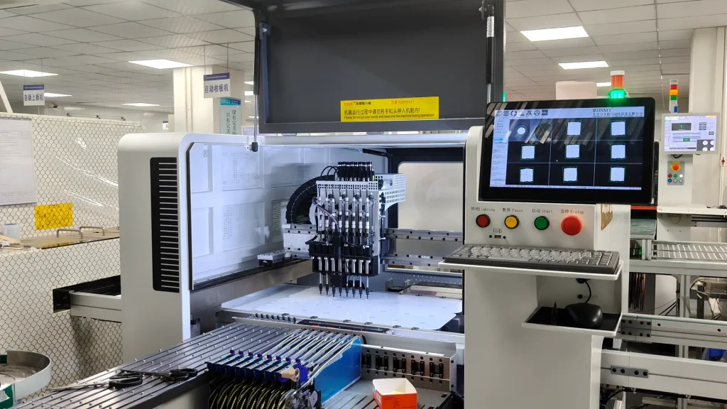 SMT pick and place machine assembling LED light board in production