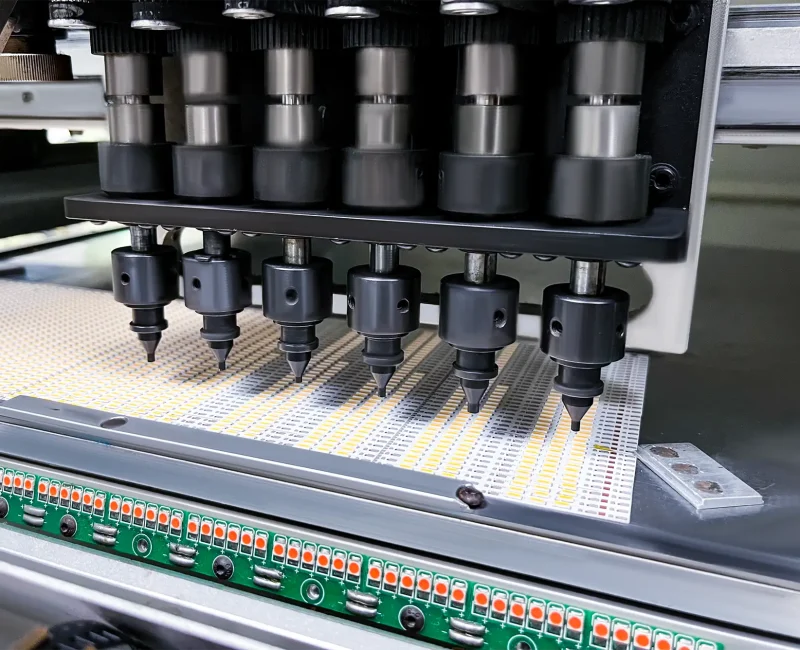 SMT pick and place machine mounting LED chips onto PCB board